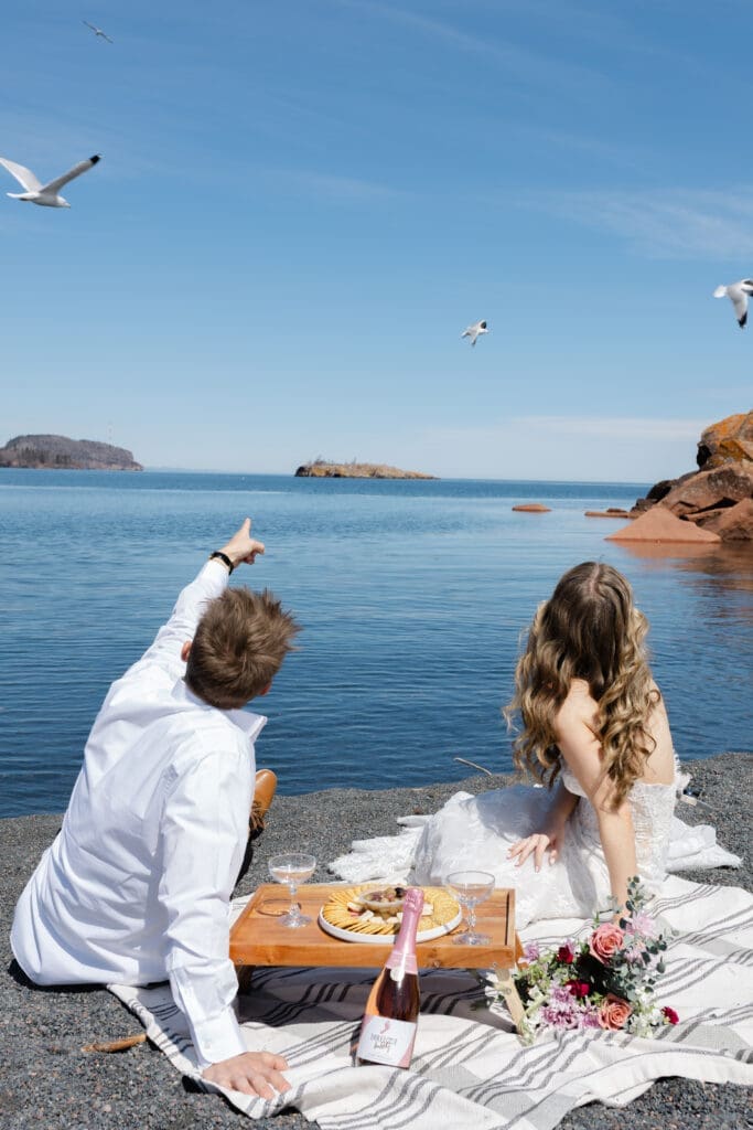 Couple sitting on Black Beach.